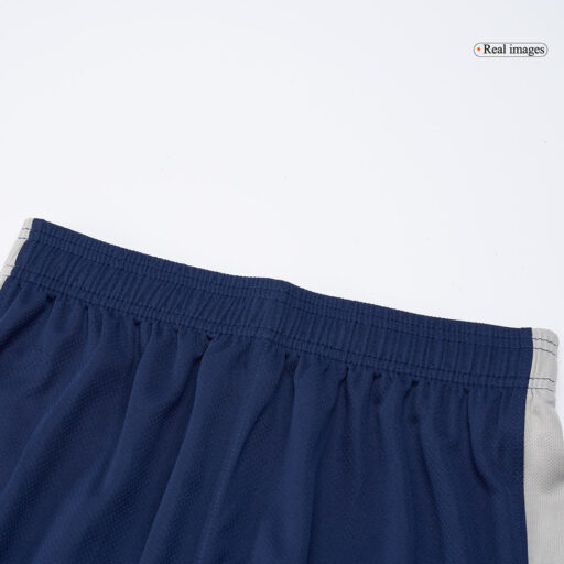 Pantalones cortos de fútbol local Tottenham Hotspur 2025 26 mangas